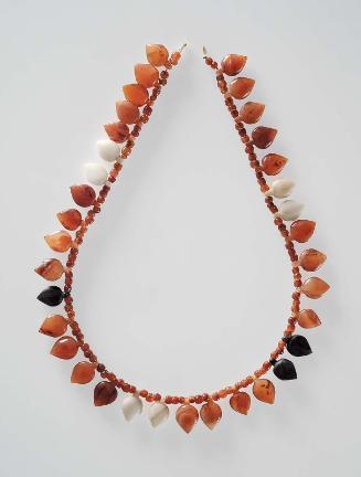 Necklace with leaf-shaped beads