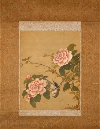 Two birds on a flowering branch (cedrela adorata) near a bamboo plant