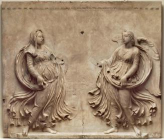 Pair of Angels re-carved into an Annunciation
