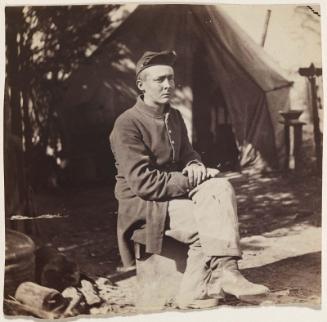 Seated Soldier in Camp