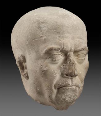 Head of an older man, possibly a priest