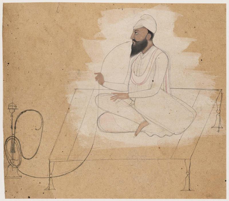 A Man Smoking a Huqqa