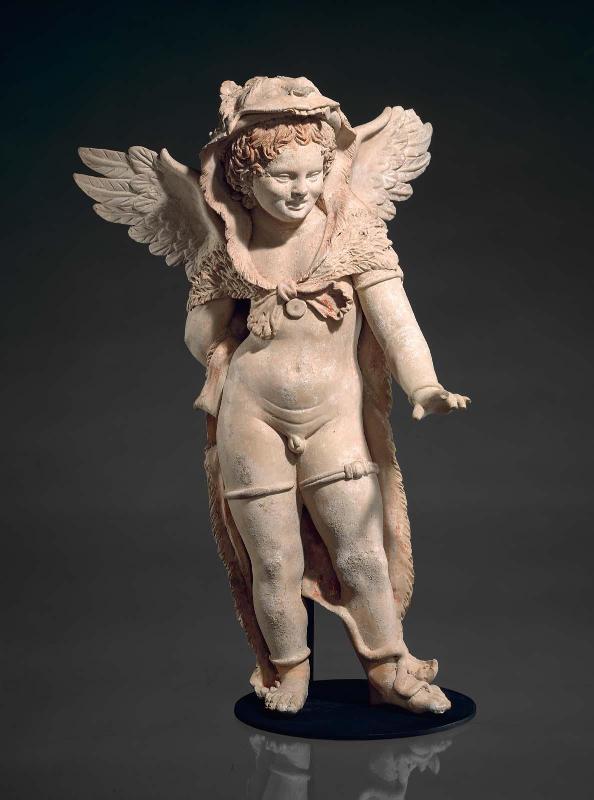 Statuette of Eros wearing the lionskin of Herakles