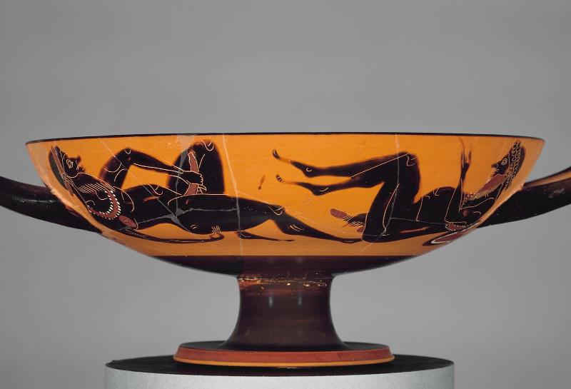 Drinking cup (kylix) depicting two satyrs