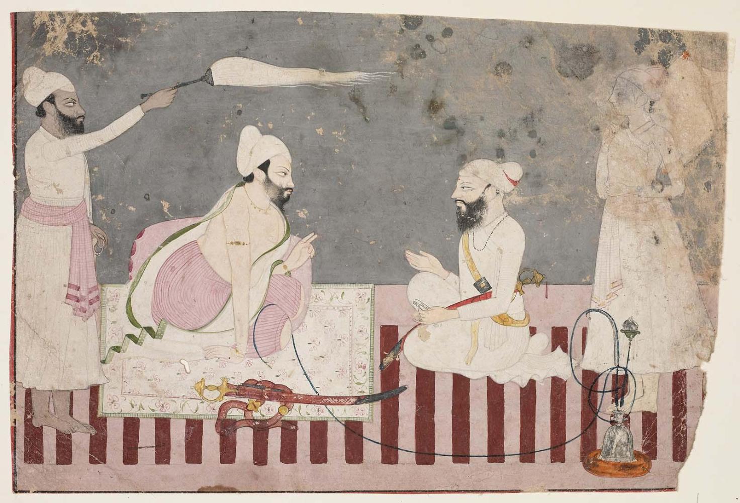 Raja Bahadur Singh of Bhoti conversing with an officer on a striped dharri