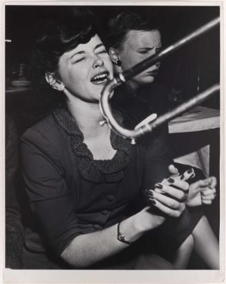 Untitled from chapter "Saturday Night" in Weegee's People (Fans at a Big Band Concert)