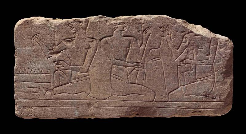 Relief of men playing senet