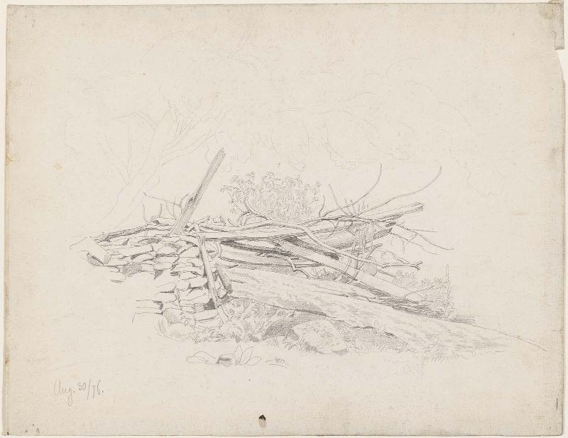 Barrier of Logs beside a Stone Wall