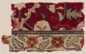 Fragment of a lattice-and-blossom carpet