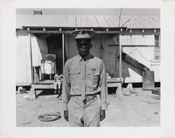 Untitled (Black Soldier in Front of Shanty) from Few Comforts or Surprises