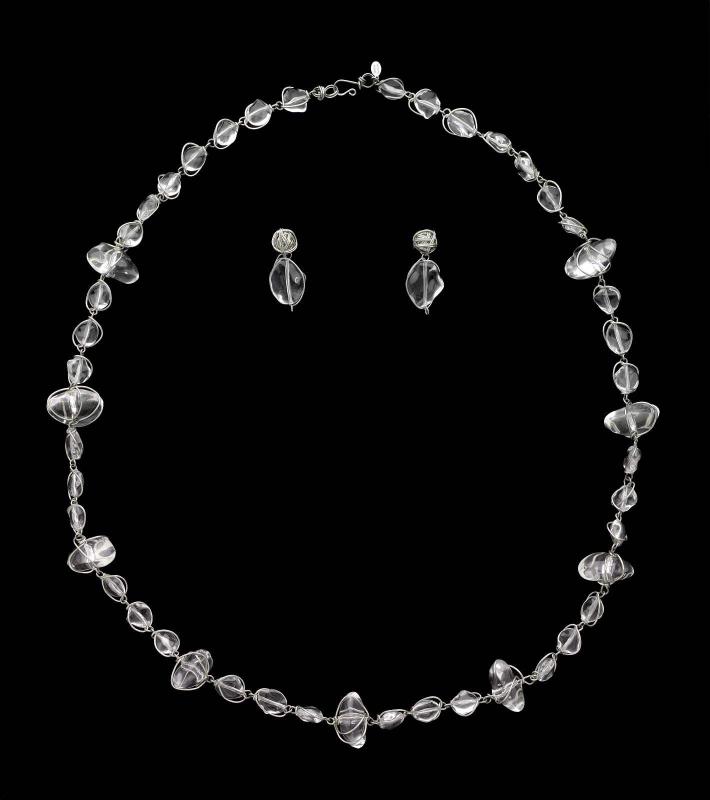 Necklace with caged, clear-plastic "rocks" with matching earrings
