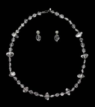Necklace with caged, clear-plastic "rocks" with matching earrings