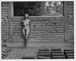 Nude Against Wall