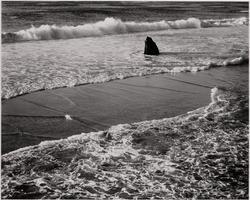 Rocky Outcrop Surrounded by Surf
