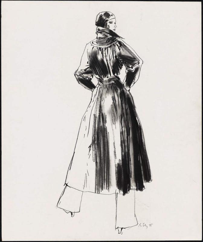 Young woman in long coat and slacks