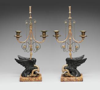 Pair of 'eagle and serpent' candelabra