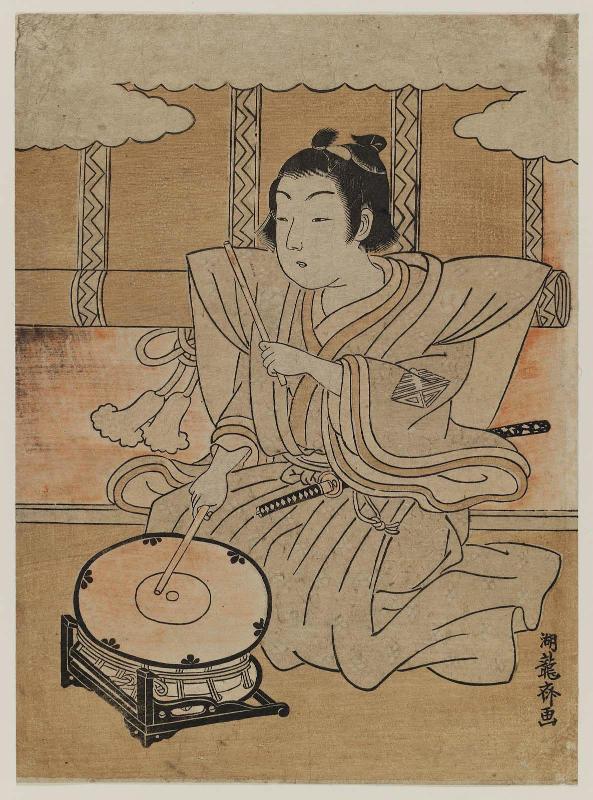 Child Playing Drum on Stand