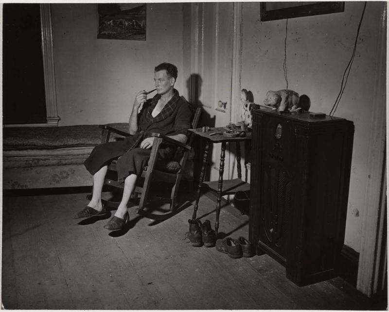 Man in Rocker with Pipe, South End