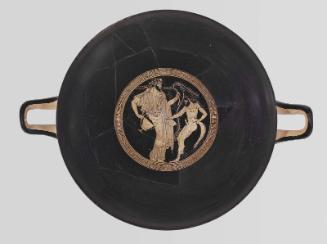 Drinking cup (kylix) with Dionysos and a satyr