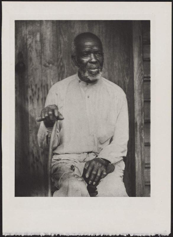 Seated Man with Cane