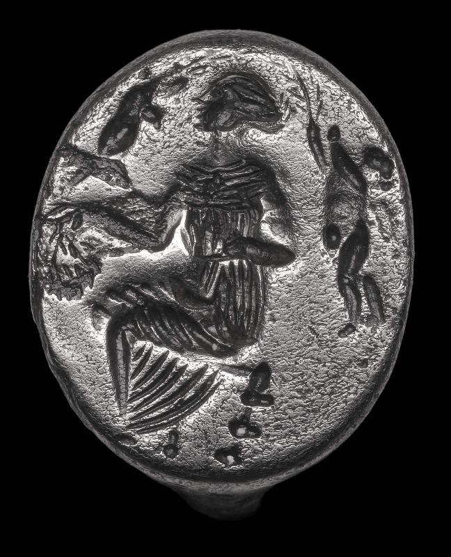 Ring with seated woman, possibly Aphrodite, between two Erotes