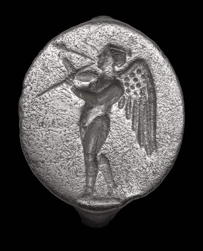 Ring with Eros playing a double flute