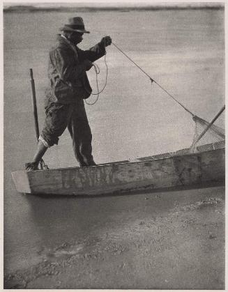Man in Small Boat