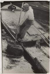 Man Dredging Canal