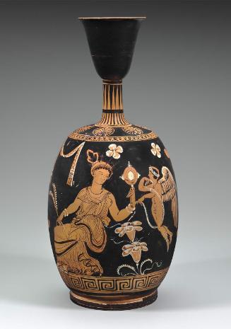 Oil bottle (lekythos) with a woman looking in a hand-held mirror