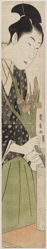 Young Man Arranging Iris in a Vase