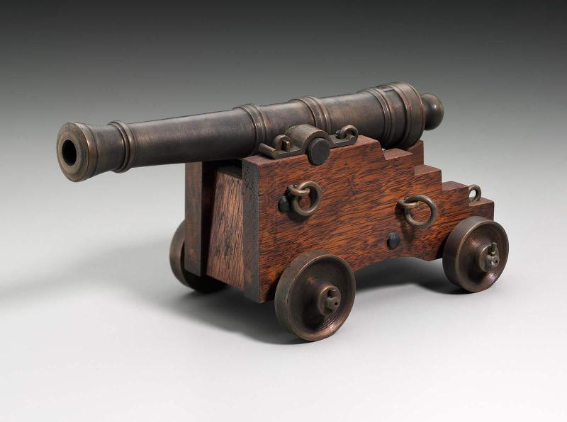 Miniature brass ship's cannon