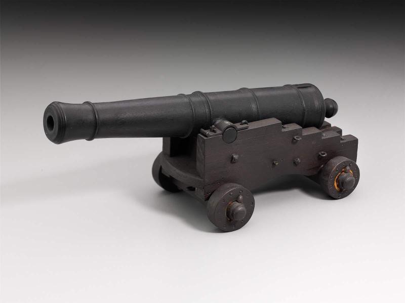 Miniature brass ship's cannon