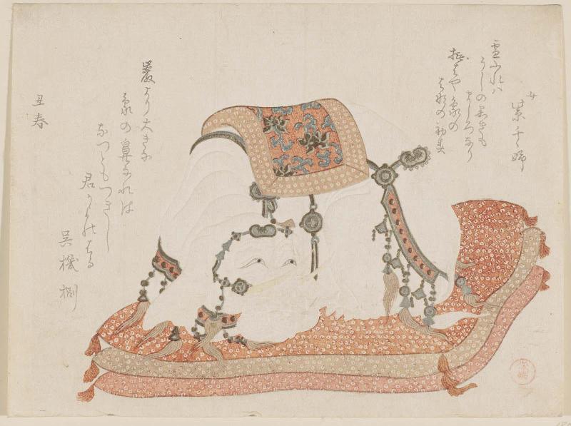 White Elephant Figurine on a Cushion
