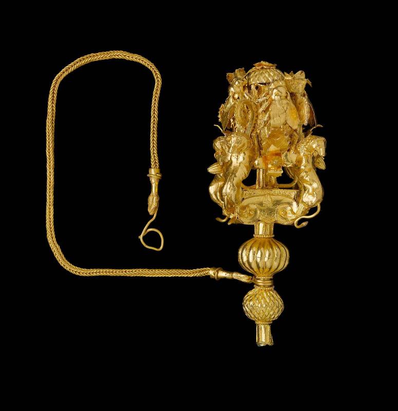 Head of a pin with lions, bees, an ionic capital, and foliage