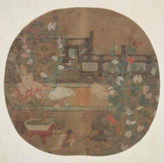 Child with his pets in a flower garden