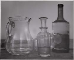 Still life with bottles and pitcher in twilight, Italy