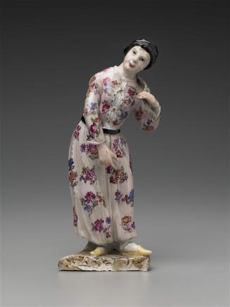Figure of  a sultan with an African attendant