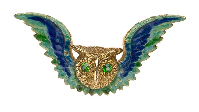 Owl watch enhancer with outstretched wings