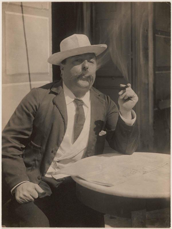 Man at Cafe with Cigar