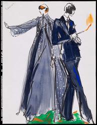 Two female models, on in sheer evening coat with dress, the other in a men's style suit holding a flaming cigarette