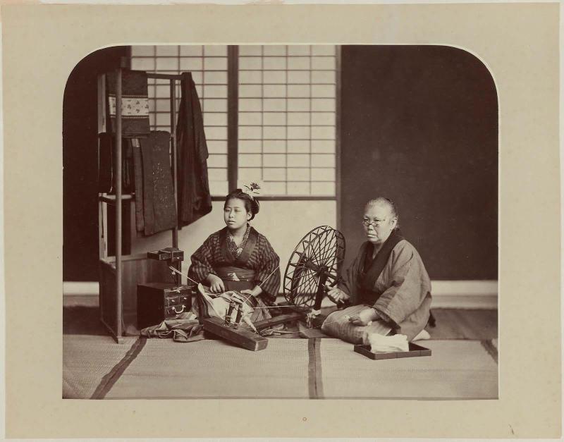 Women and Spinning Wheel