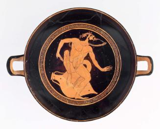 Drinking cup (kylix) with satyr seated on a storage jar (amphora)