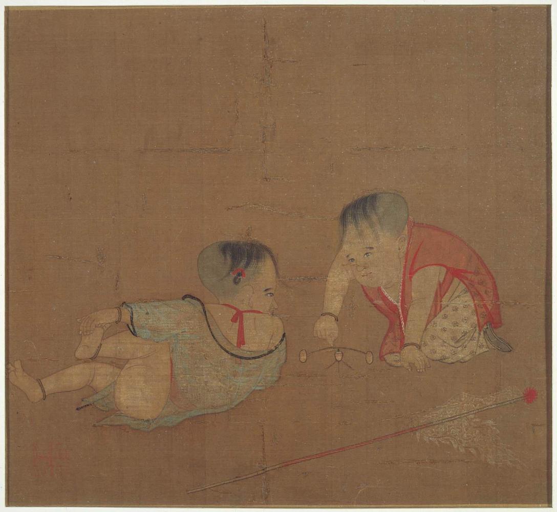 Children playing with a balance toy