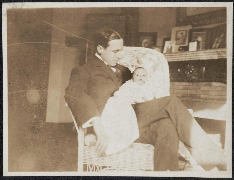Walter Clark Howe holding Emily Howe (his daughter), 303 Beacon St., Boston