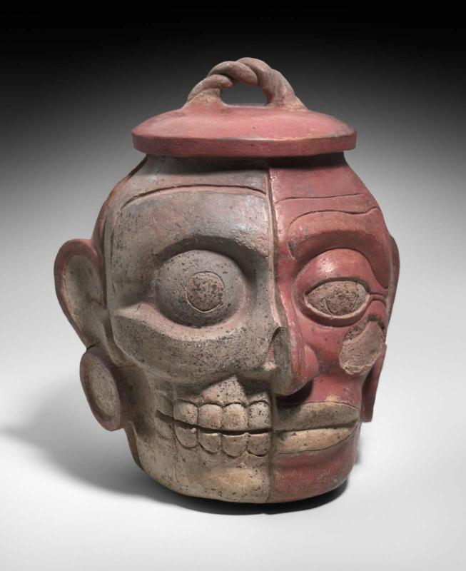 Human head effigy jar