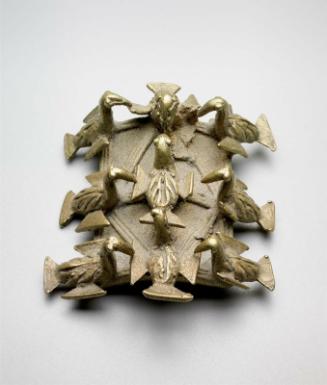 Gold Weight in the form of a War Dance Shield with Decorations and Nine birds