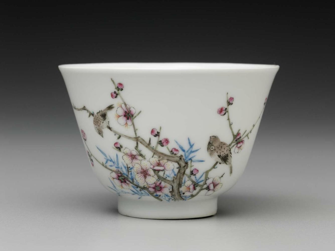 Cup with flowering plum and magpies