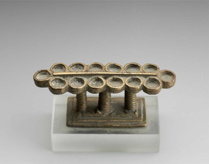 Gold Weight in the form of a Mankala or Wari Gameboard