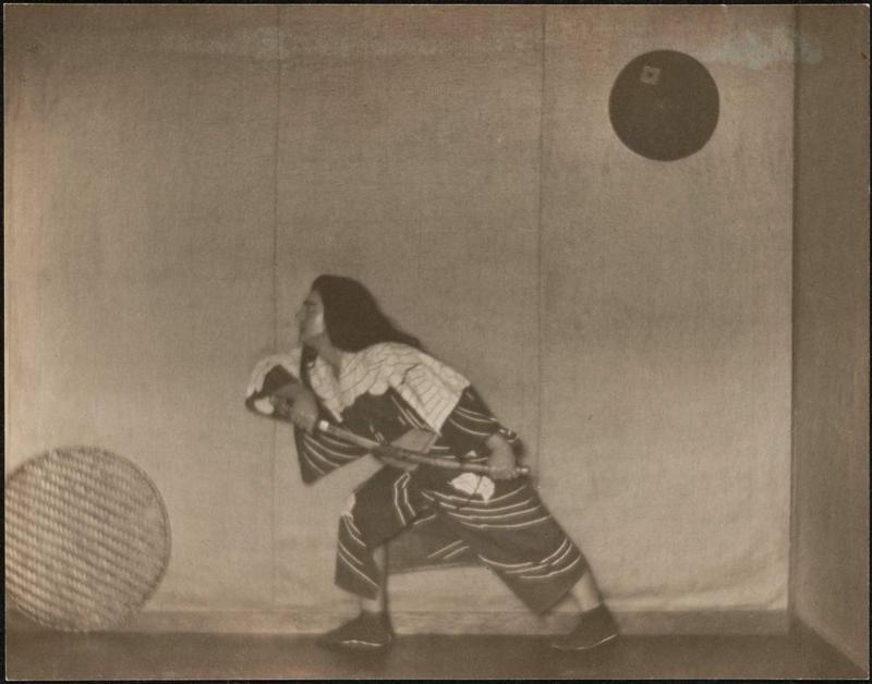 Lunging man in Samurai? costume