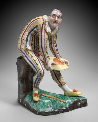 Figure of a Greeting Harlequin
